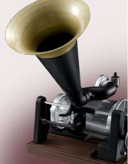 By applying the mechanism of Thomas Edisons phonograph,