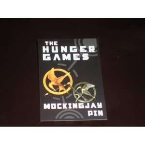    The Hunger Games Movie Mockingjay Pin Replica US Toys & Games