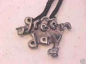 OLDER GREEN DAY NECKLACE PENDANT ON ROPE CORD  