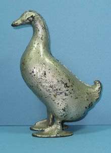 1909/35 CAST IRON DUCK BANK CURLY TAIL TIP GUARANTEED OLD & AUTHENTIC 