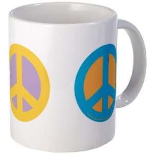   Red, Yellow Blue Peace Signs Love Mug by CafePress: Kitchen & Dining