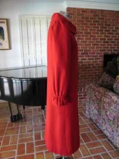 This lovely vintage red wool coat is lightweight, and appropriate for 
