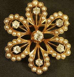 14KT Y/Gold Brooch With Seed Pearl and 7 Round Diamonds  