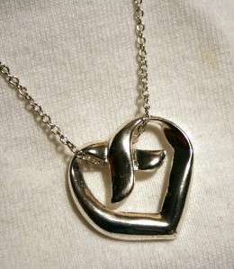 Shiny Petite Swirled Silvertone Heart Pendant Necklace  