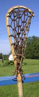  wooden lacrosse stick. Measures 40 long. The lacrosse stick 