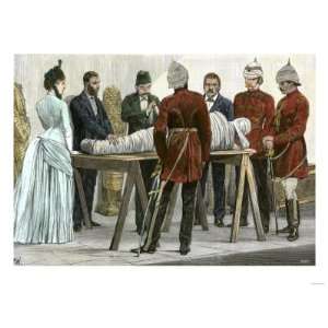 British and Egyptian Officials Unwrapping an Egyptian Mummy in the 