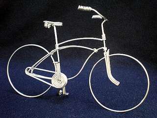 THIS SCHWINN CRUISER BICYCLE IS A SINGLE PIECE OF ALUMINIUM WIRE